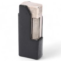 A vintage silver Dunhill Rollagas lighter, marked 925 to base with makers mark AD, engine turned