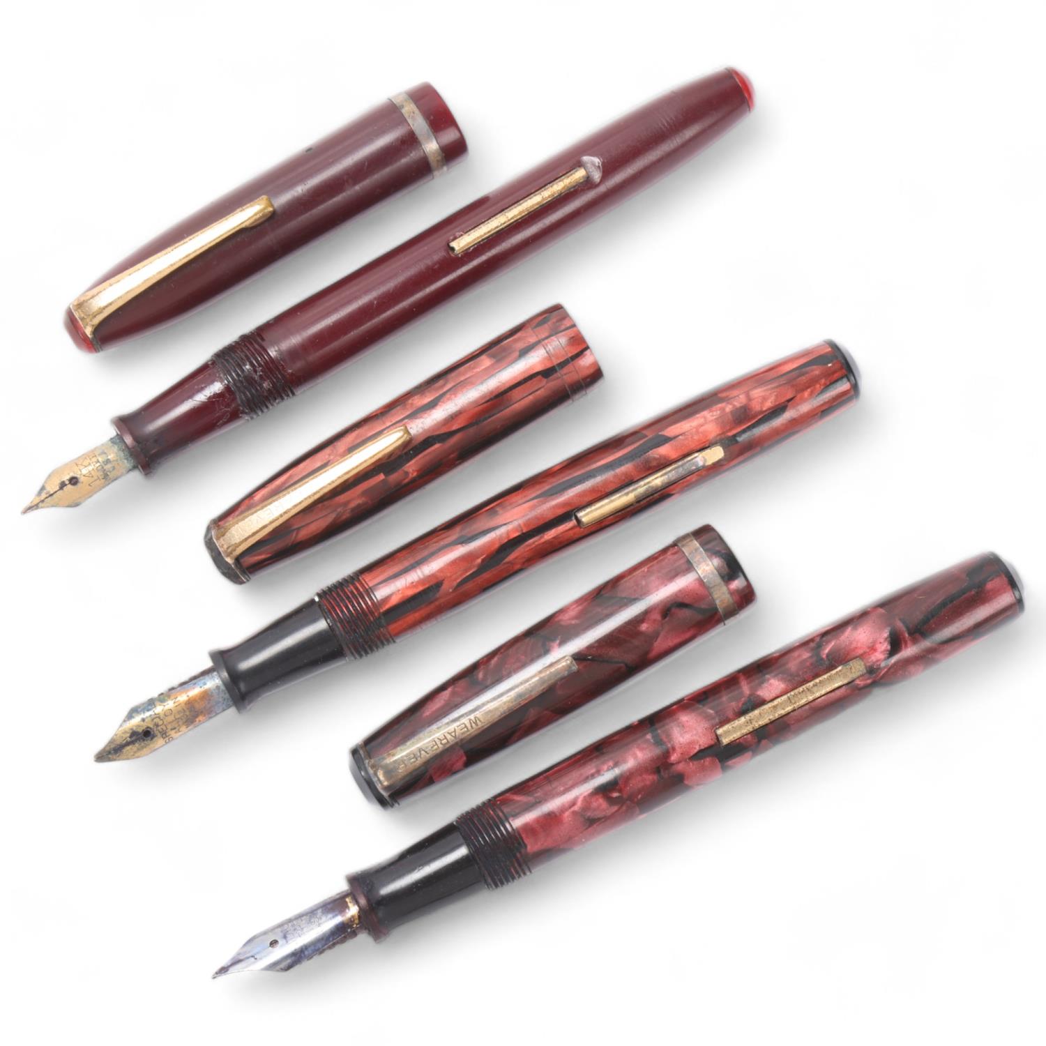 3 vintage Wearever, USA, lever fill fountain pens, circa 1940s' Marbled pens in complete untested