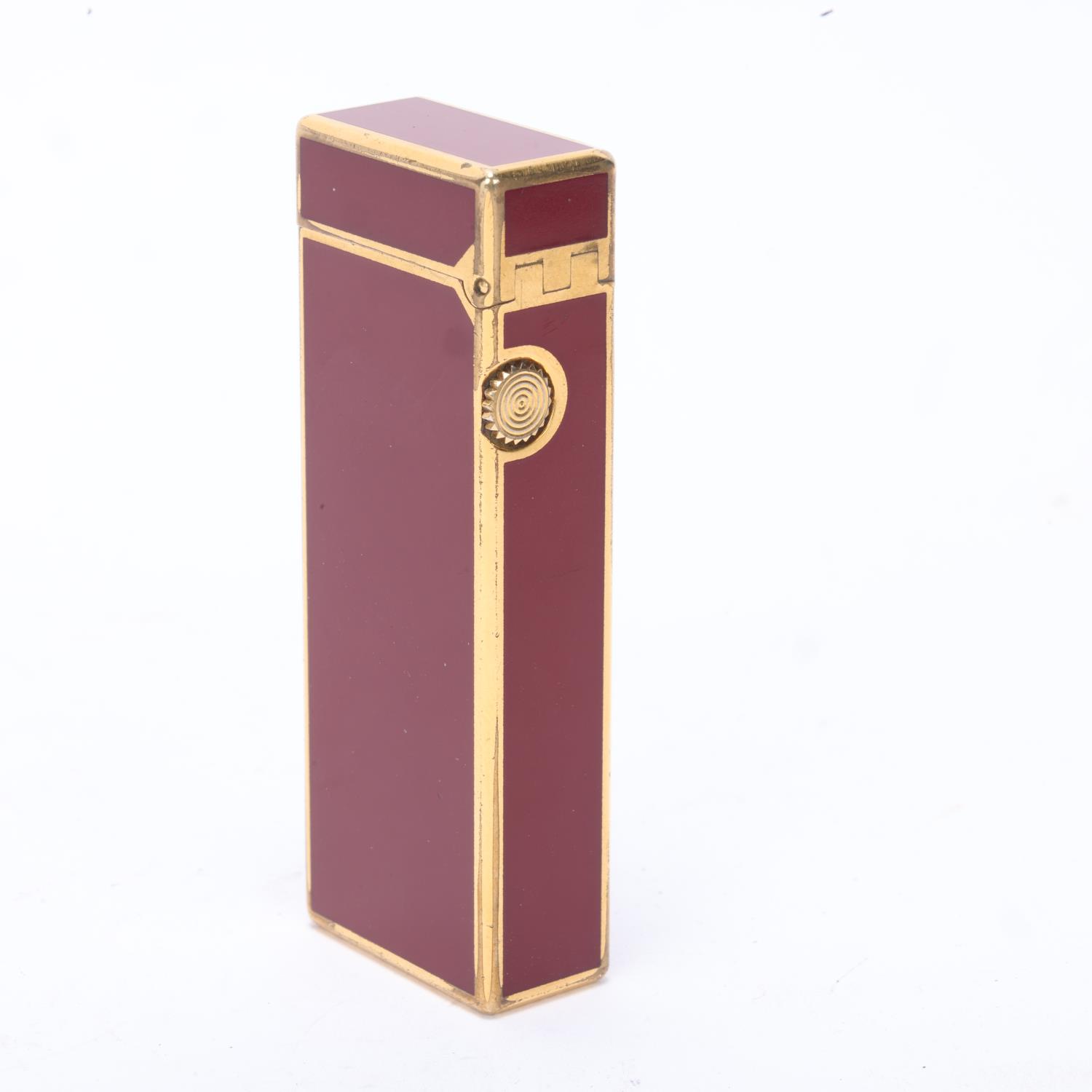 A vintage Dunhill Rollagas lighter, with gold plated and red lacquer body, makers marks to base, - Image 3 of 4