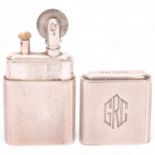 A 1946 hallmarked silver "The Howitt Lighter", engine turned body with initials GRC on cap, Untested