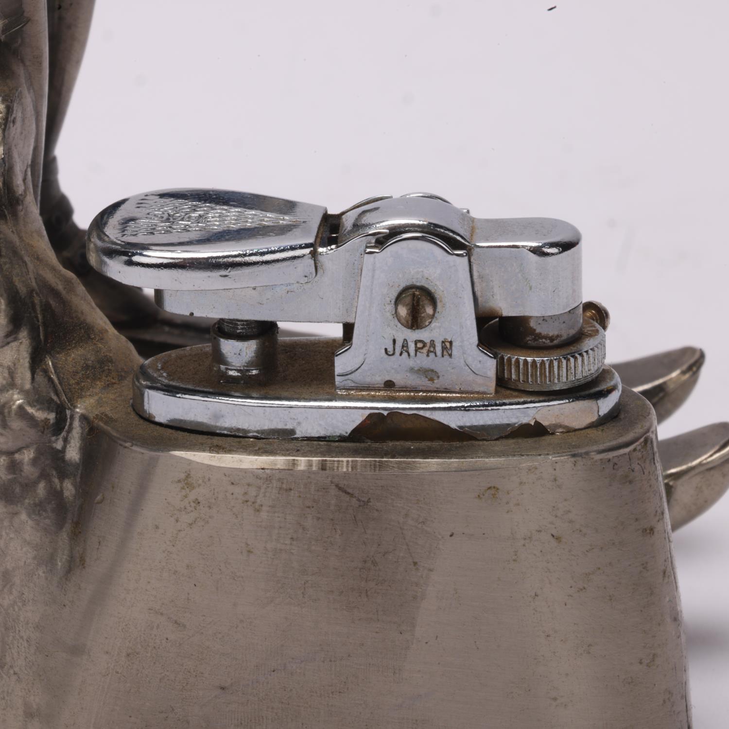 A Comoys table lighter in a a downhill skier aluminium base, height 12.5cm Skier is missing 1 - Image 4 of 4