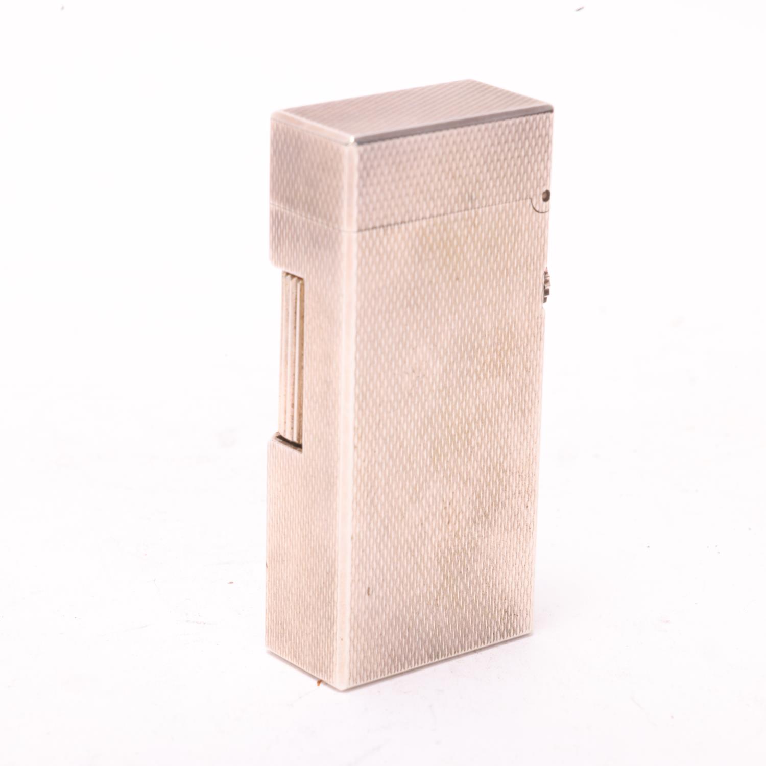 A vintage Dunhill silver plated Rollagas lighter, engine tuned body, makers marks to base No - Image 2 of 4