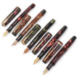 5 vintage Parker fountain pens, with marbled resin bodies lever and sprung pump "Vacumatic" fill,