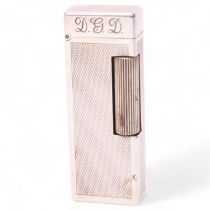 A vintage Dunhill silver plated Rollagas lighter, with unusual automatic flip-top mechanism,