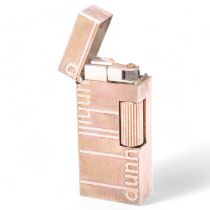 A vintage Dunhill silver plated Rollagas lighter, with Dunhill detail to body, makers marks to