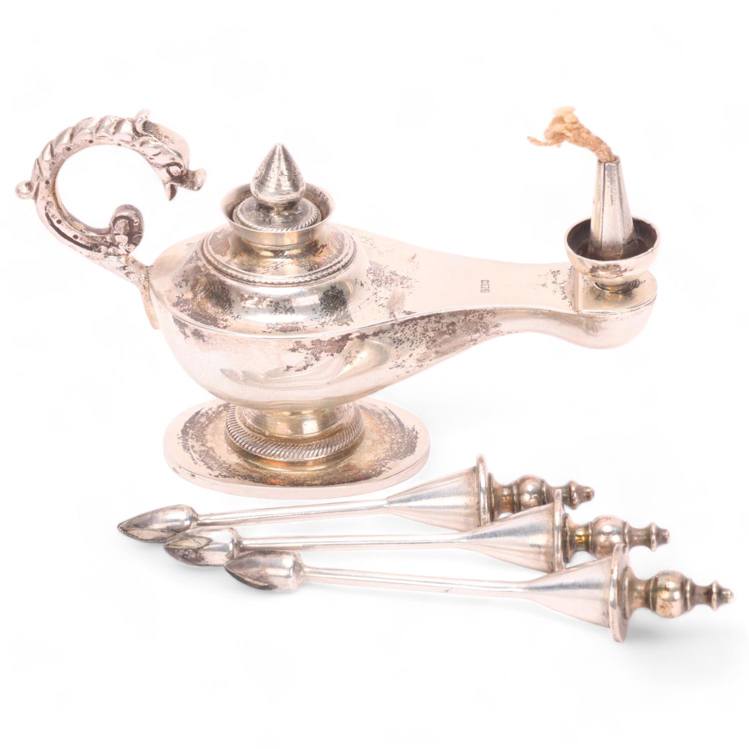 An Egyptian silver lamp/lighter in the form of a Roman lamp, together with 3 silver plated cigar/