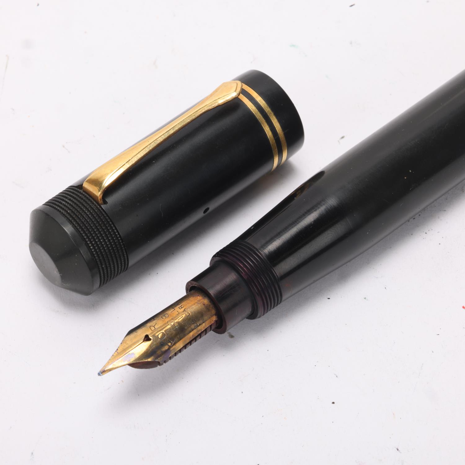 A Ford's Patent fountain pen, circa 1930, black rubber body, nib marked 428 Mill, 14ct, length 16 cm - Image 2 of 4