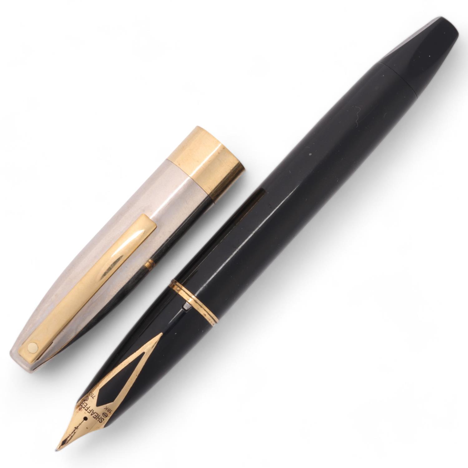 A Sheaffer Legacy Heritage fountain pen, with black body and palladium cap and 18ct gold nib