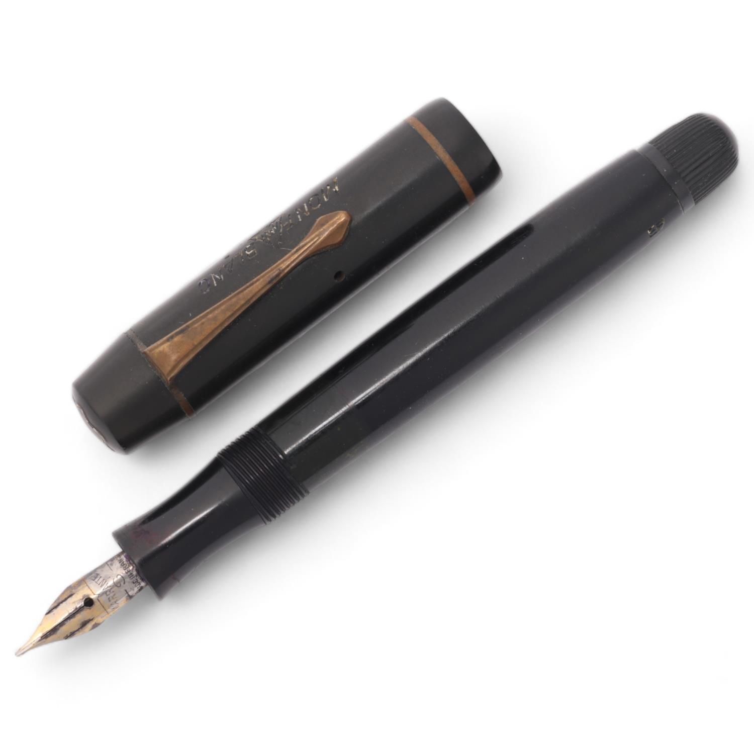 A vintage Montblanc 332 fountain pen, piston fill, makers mark to cap Replacement nib, otherwise