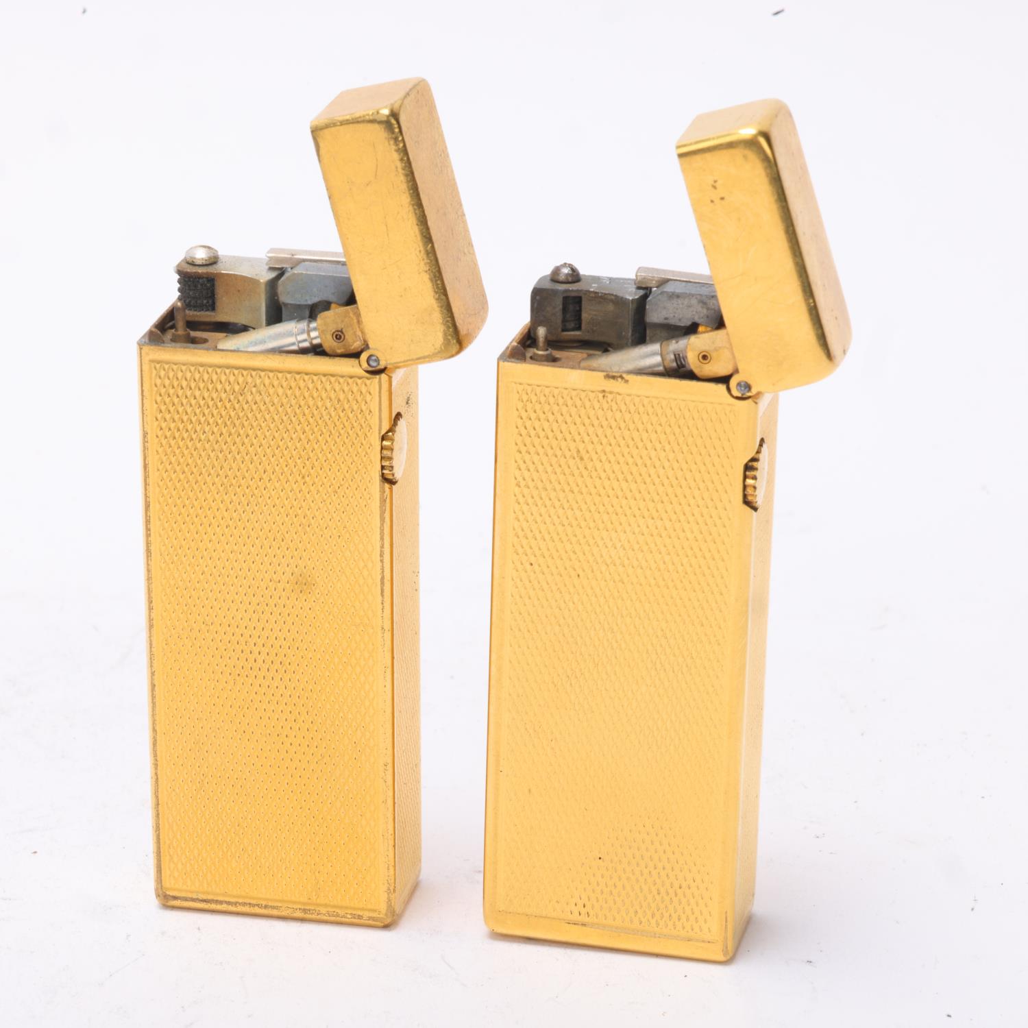 2 vintage Dunhill gold plated Rollagas lighters, with engine turned bodies, mechanism USA Pat No - Image 2 of 4