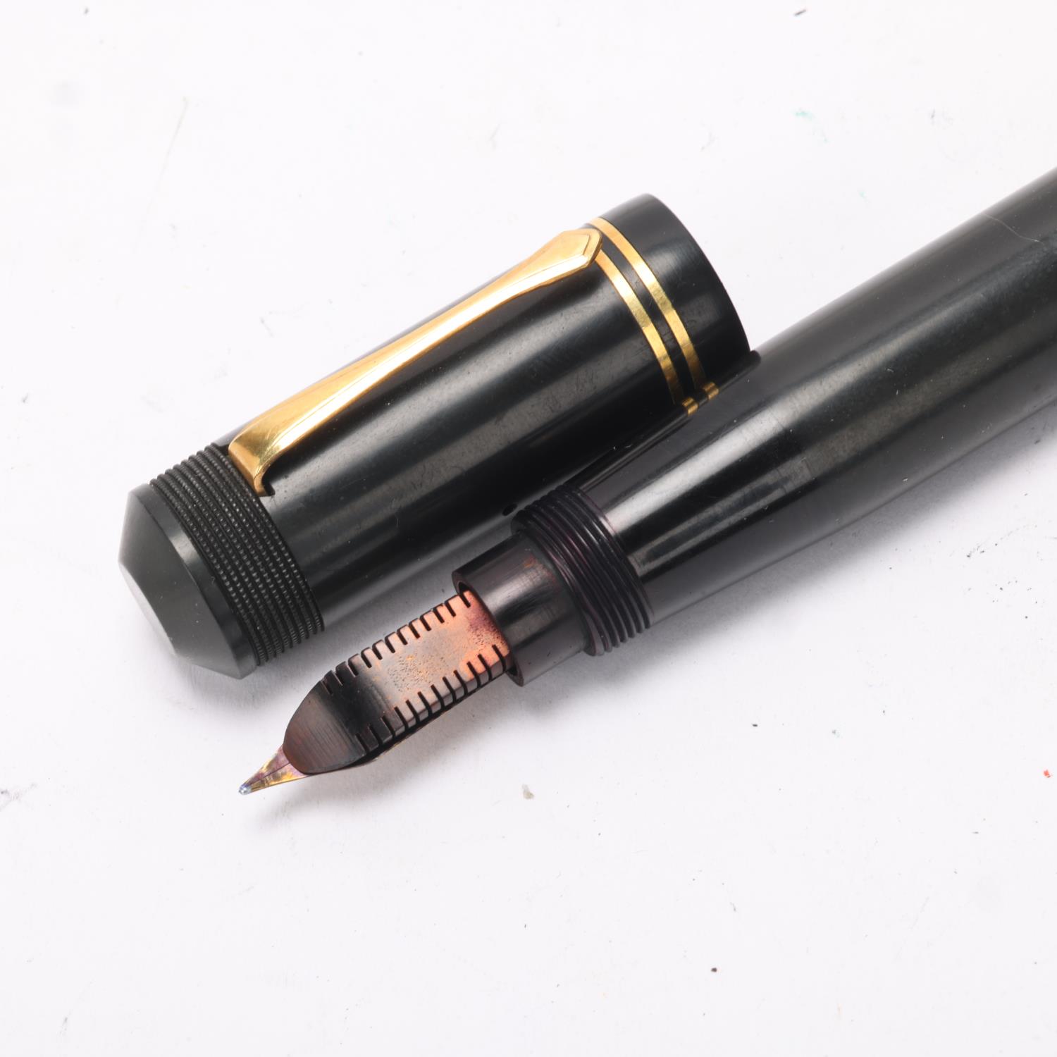 A Ford's Patent fountain pen, circa 1930, black rubber body, nib marked 428 Mill, 14ct, length 16 cm - Image 3 of 4