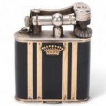 A 1929 hallmarked silver Dunhill lighter, with gilt and black lacquer body, gilt metal crown detail,