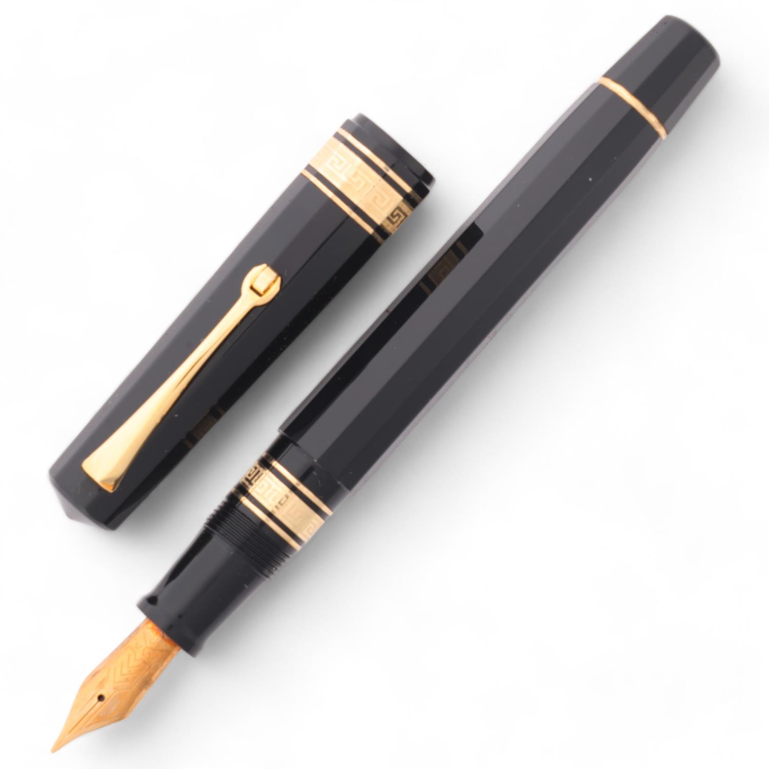 An Omas Dama fountain pen, with 14ct EF nib and black resin piston fill body, boxed with papers Very