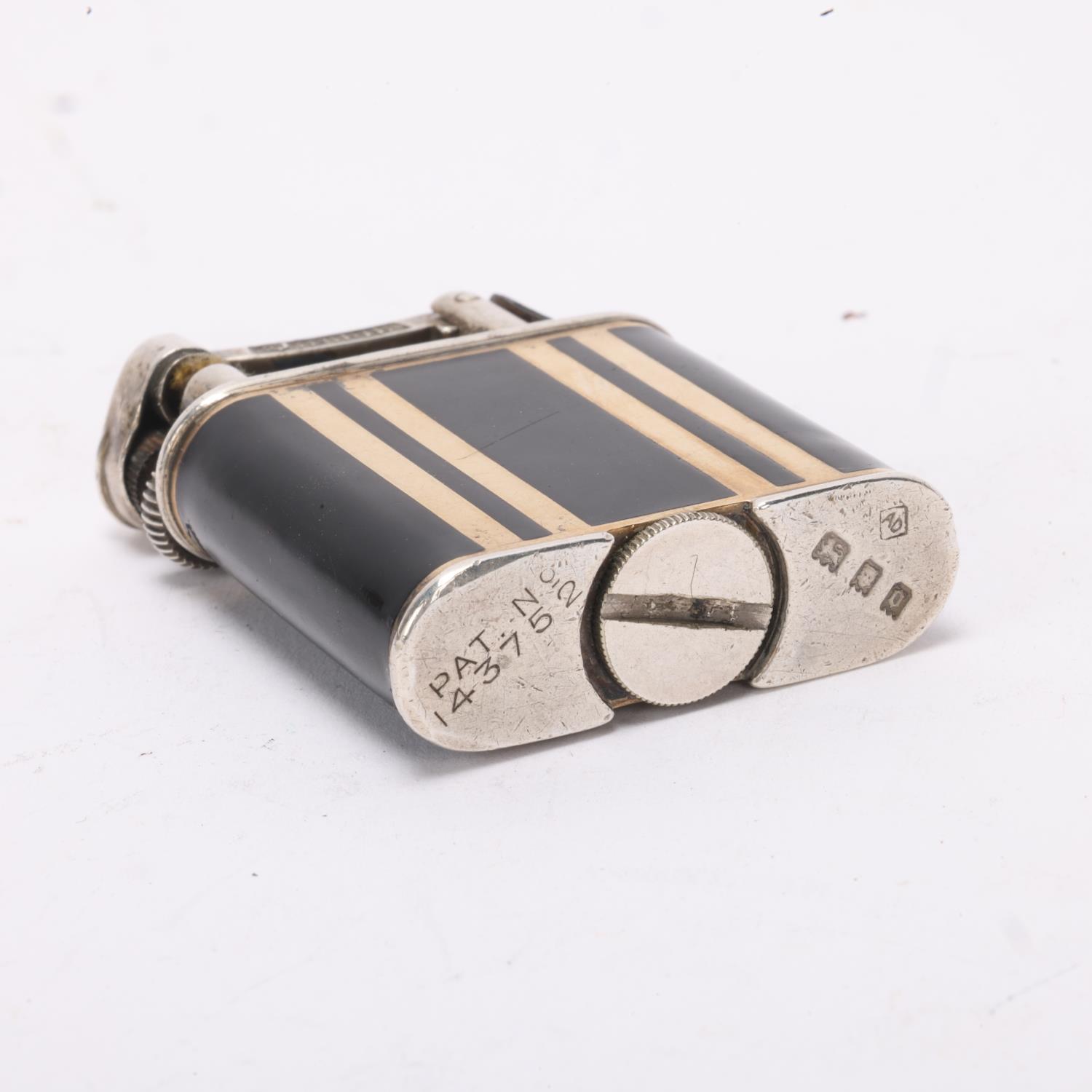 A 1929 hallmarked silver Dunhill lighter, with gilt and black lacquer body, gilt metal crown detail, - Image 3 of 4