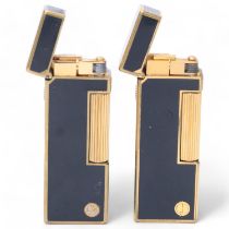 2 vintage Dunhill Rollagas lighters, gold plated and black lacquer bodies, makers marks to base,