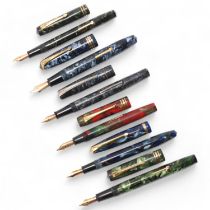 6 Vintage Conway Stewart lever fill fountain pens, all with marble resin bodies and 14ct gold nibs