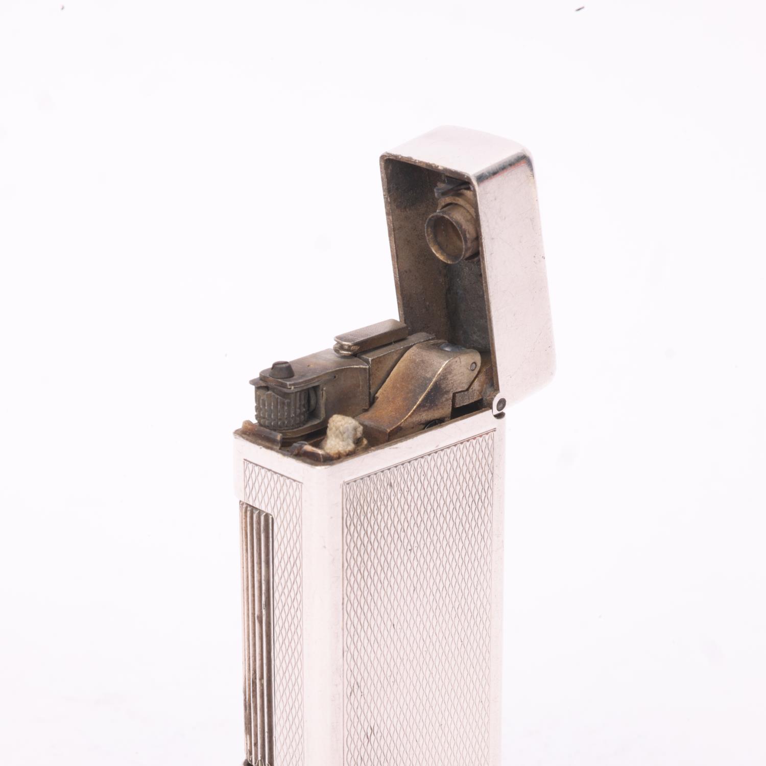 A vintage Dunhill silver plated Rollagas lighter, with unusual automatic flip-top mechanism, - Bild 4 aus 4