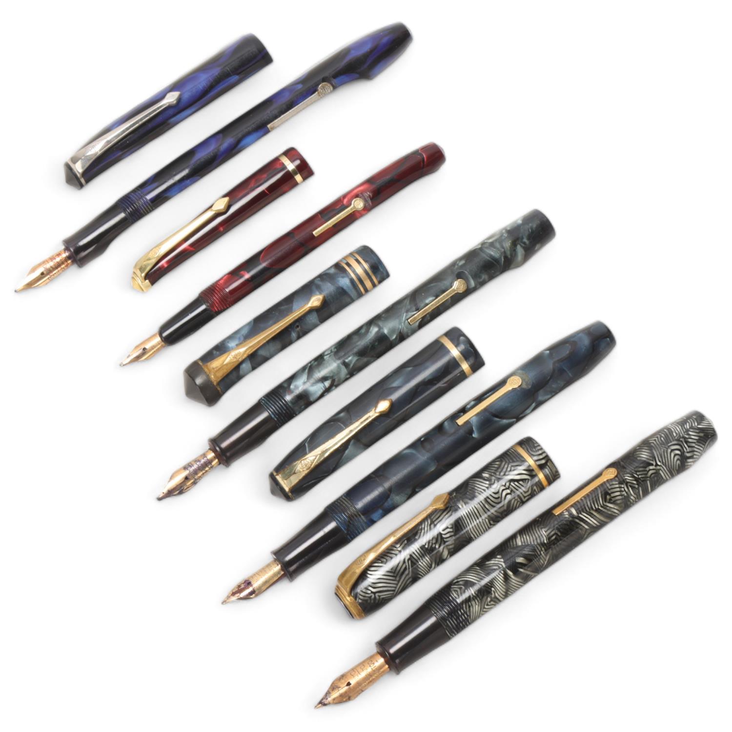 5 Vintage Conway Stewart fountain pens, all lever fill with marble resin bodies and 14ct gold