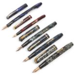 5 Vintage Conway Stewart fountain pens, all lever fill with marble resin bodies and 14ct gold