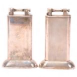 2 vintage Dunhill silver plated table lighters, makers marks to hammer arm, height 10.5cm Both