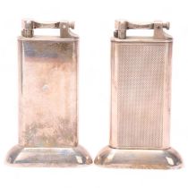 2 vintage Dunhill silver plated table lighters, makers marks to hammer arm, height 10.5cm Both
