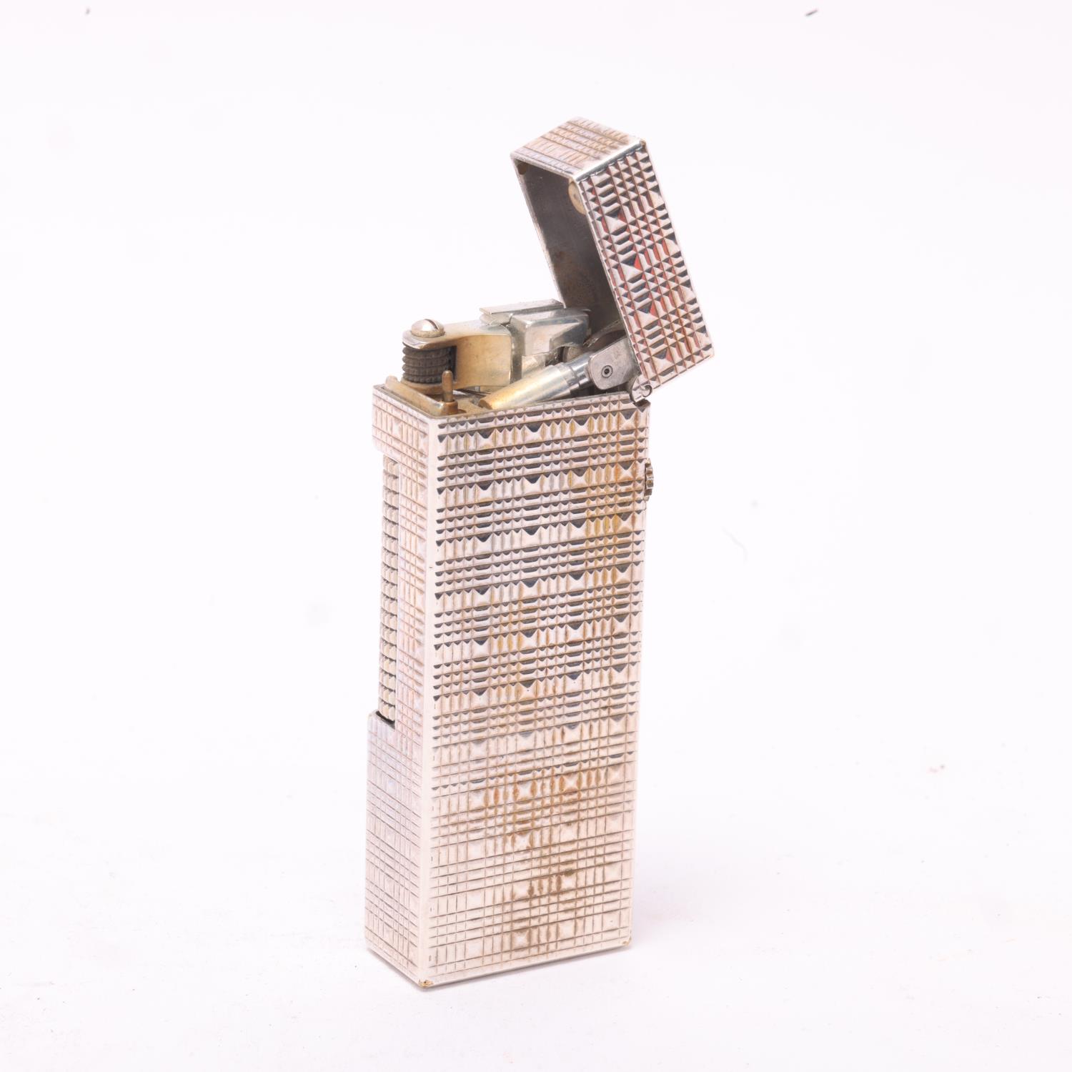 A vintage Dunhill Rollagas lighter, with silver plated textured body, makers marks to base, length - Image 2 of 4