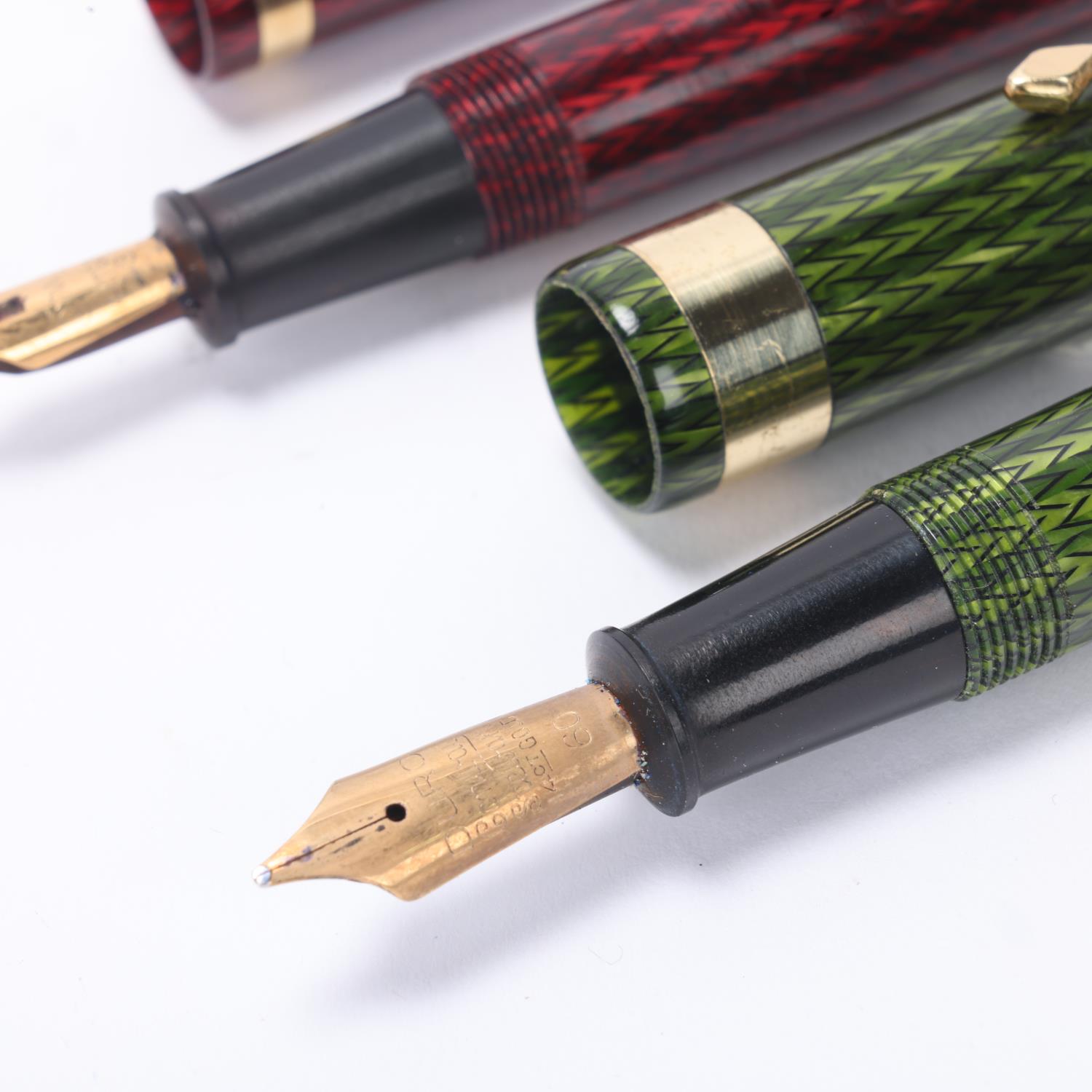 2 vintage Conway Stewart lever fill fountain pens, with 14ct nibs and herringbone lacquer bodies, - Bild 2 aus 4