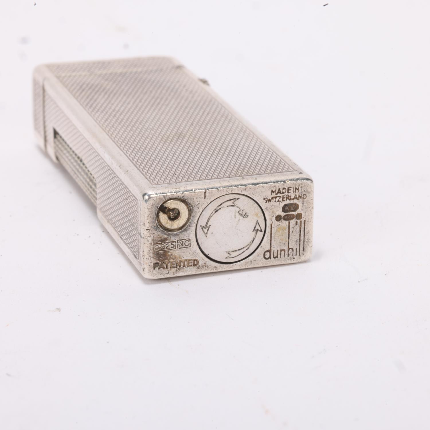 A vintage silver Dunhill Rollagas lighter, marked 925 to base with makers mark AD, engine turned - Image 3 of 4