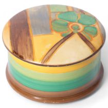 BIZARRE by CLARICE CLIFF - a hand painted circular pot and cover, diameter 8.5cm Lid has been