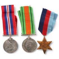 A group of Second World War medals and ribbons, with original box