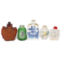 A group of Oriental scent bottles, including a blue and white example, 3 internally painted