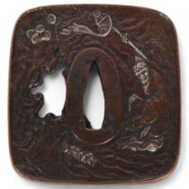 A Japanese bronze Tsuba with silver splash highlights, unsigned, W6.5cm