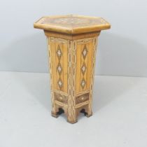 A late 19th century Syrian hexagonal side table with ebony, specimen wood marquetry and