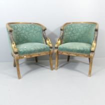A pair of French Empire style oak and walnut framed and upholstered salon chairs, with gilt