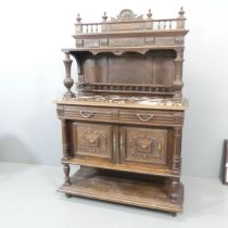 An Antique French Henri II style oak marble-topped buffet / sideboard, with two drawers above two