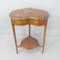 An Edwardian Sheraton revival mahogany two-tier heart shaped occasional table, with painted