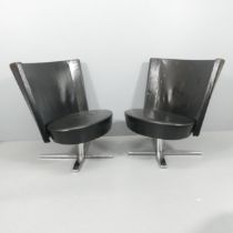 MATERIA - A pair of contemporary Swedish Centrum Grande swivel lounge chairs, designed by Kersti