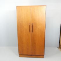 G PLAN - A mid-century Frescoe range teak wardrobe with fitted interior. 91x177x59cm.