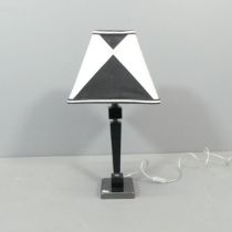 A contemporary table lamp, with resin column and chromed base. Height overall 58cm.