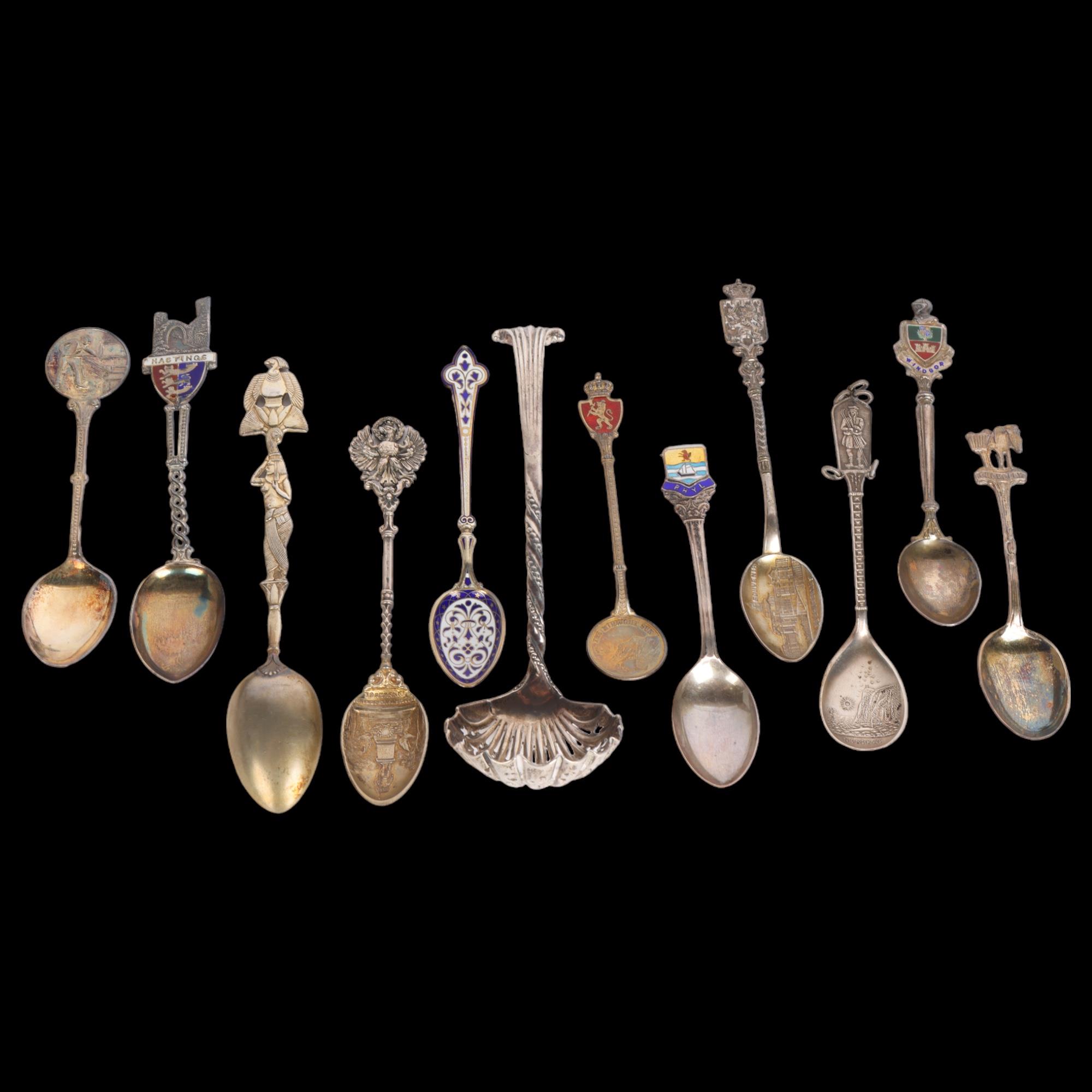 Various silver flatware, including Continental souvenir spoons, Victorian shell sugar sifter
