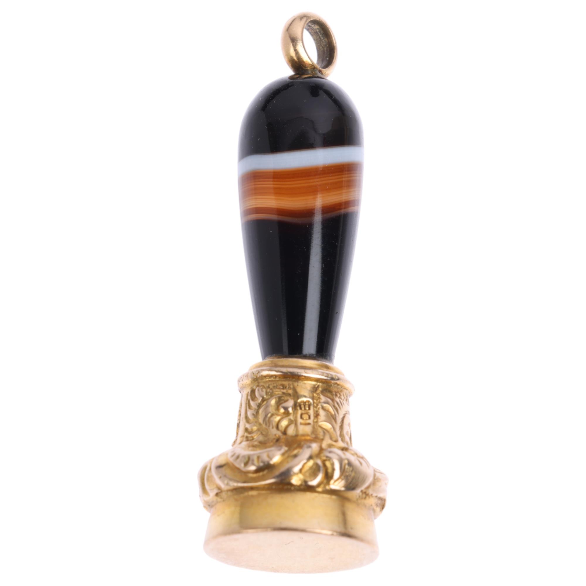 A 9ct gold banded agate fob pendant, maker IDB, London 1975, 42mm, 9.6g Condition Report: High