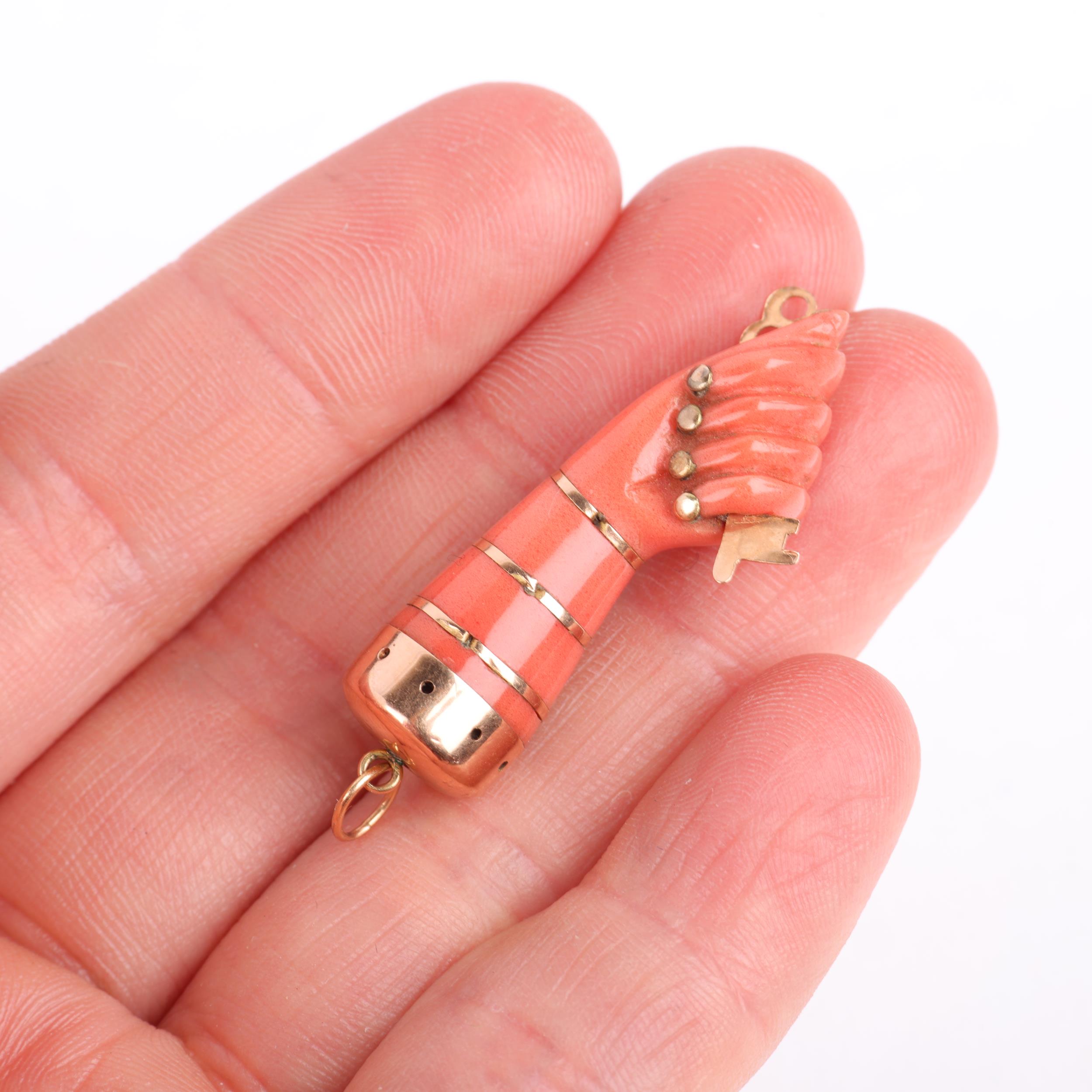 A Vintage reconstituted coral Figa hand pendant, modelled as a hand grasping a key, with unmarked - Image 4 of 4