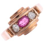 An early 20th century three stone ruby and diamond ring, set with oval mixed-cut ruby and round-