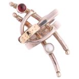 A sterling silver 14ct gold garnet and pearl abstract ring, no maker's mark, setting height 41.