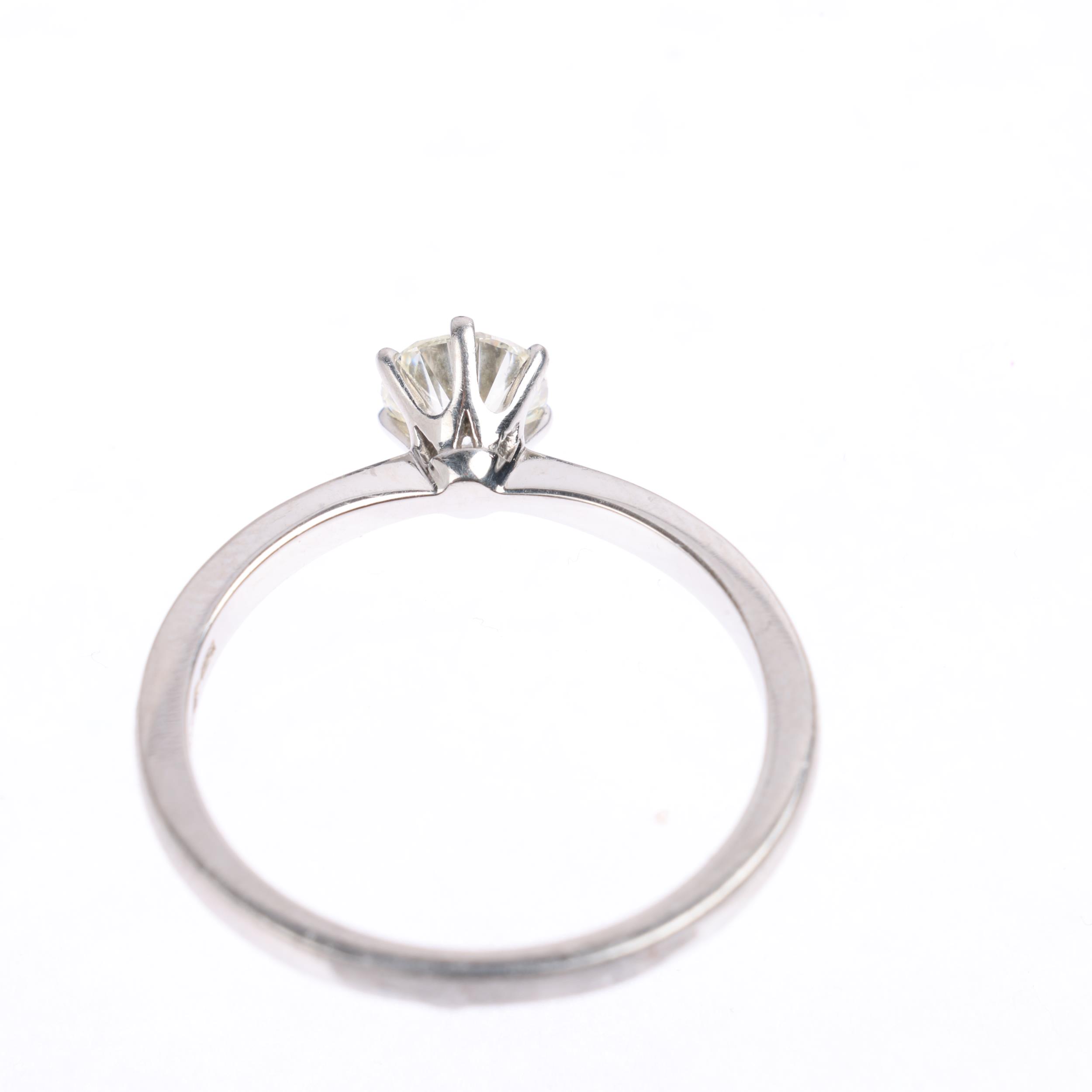 A platinum 0.7ct solitaire diamond ring, 6-claw set with modern round brilliant-cut diamond, - Image 3 of 4
