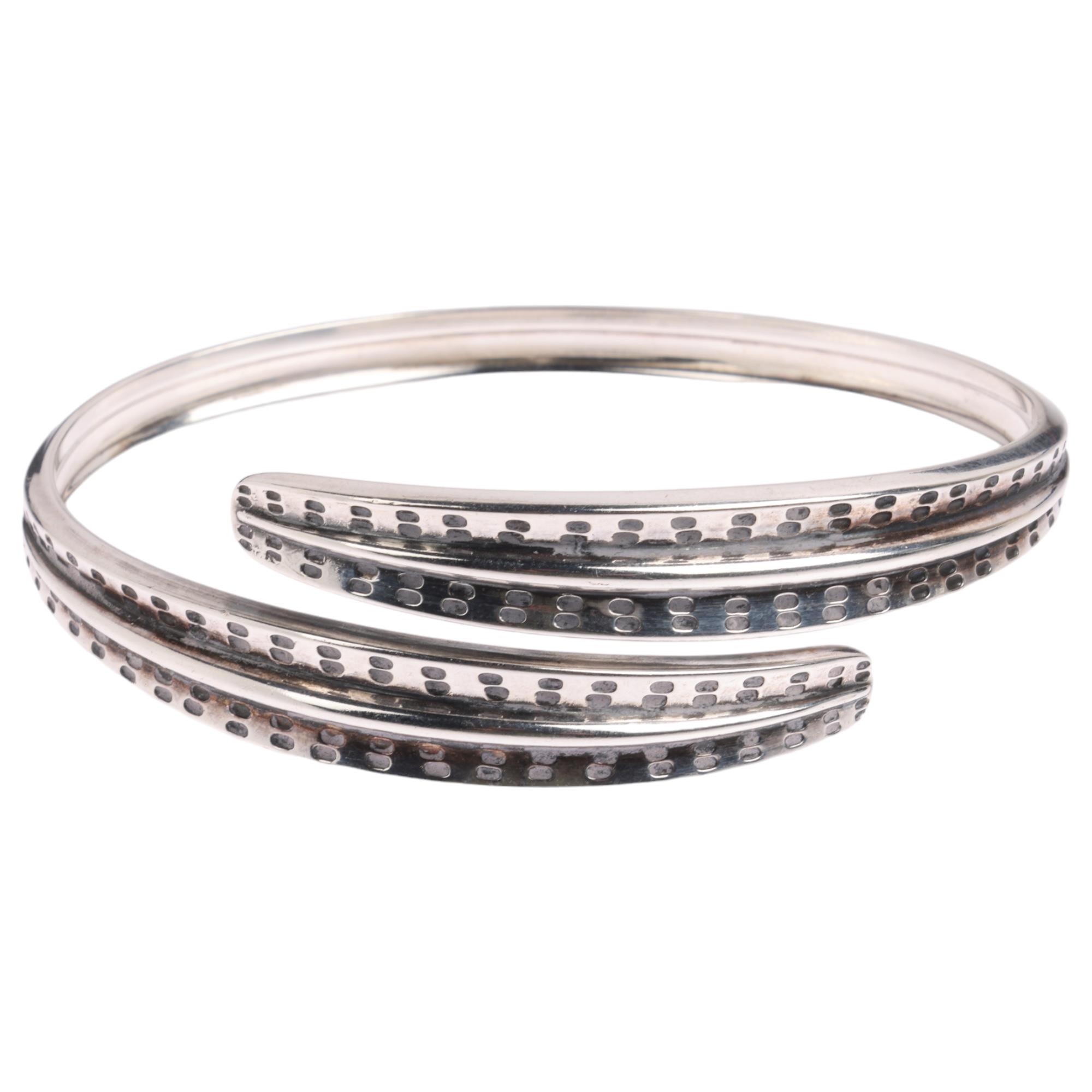 DAVID ANDERSEN - a Norwegian sterling silver Viking Revival torque bangle, a copy of original from