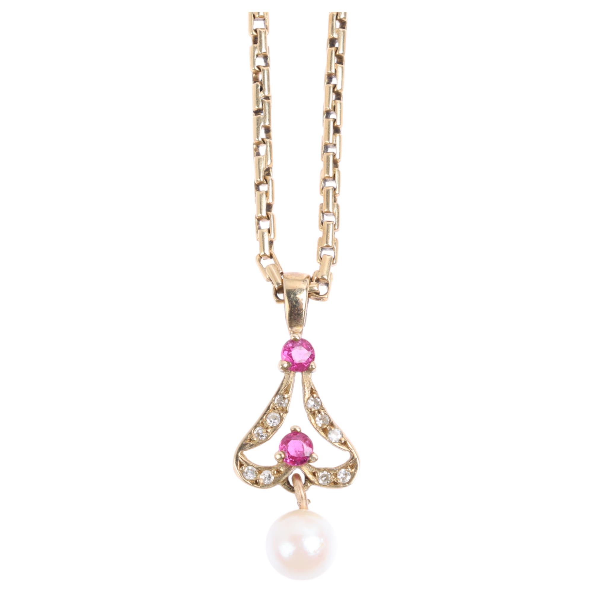 A 9ct gold ruby pearl and diamond openwork pendant necklace, on earlier 18ct chain with dog clip,