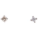 A pair of 9ct white gold 0.1ct solitaire diamond earrings, each claw set with 0.05ct modern round