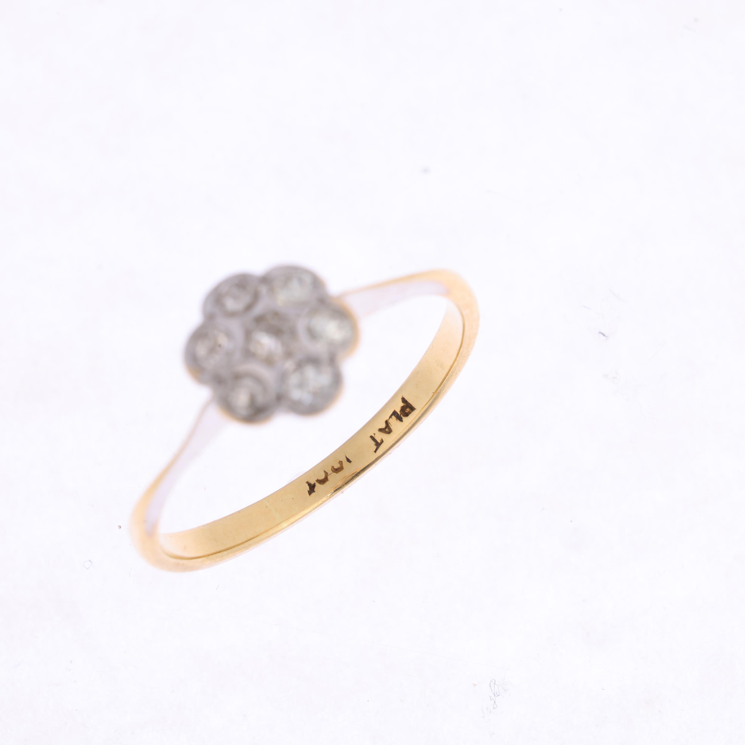 An 18ct gold diamond flowerhead cluster ring, platinum-topped set with old-cut diamonds, total - Image 2 of 4