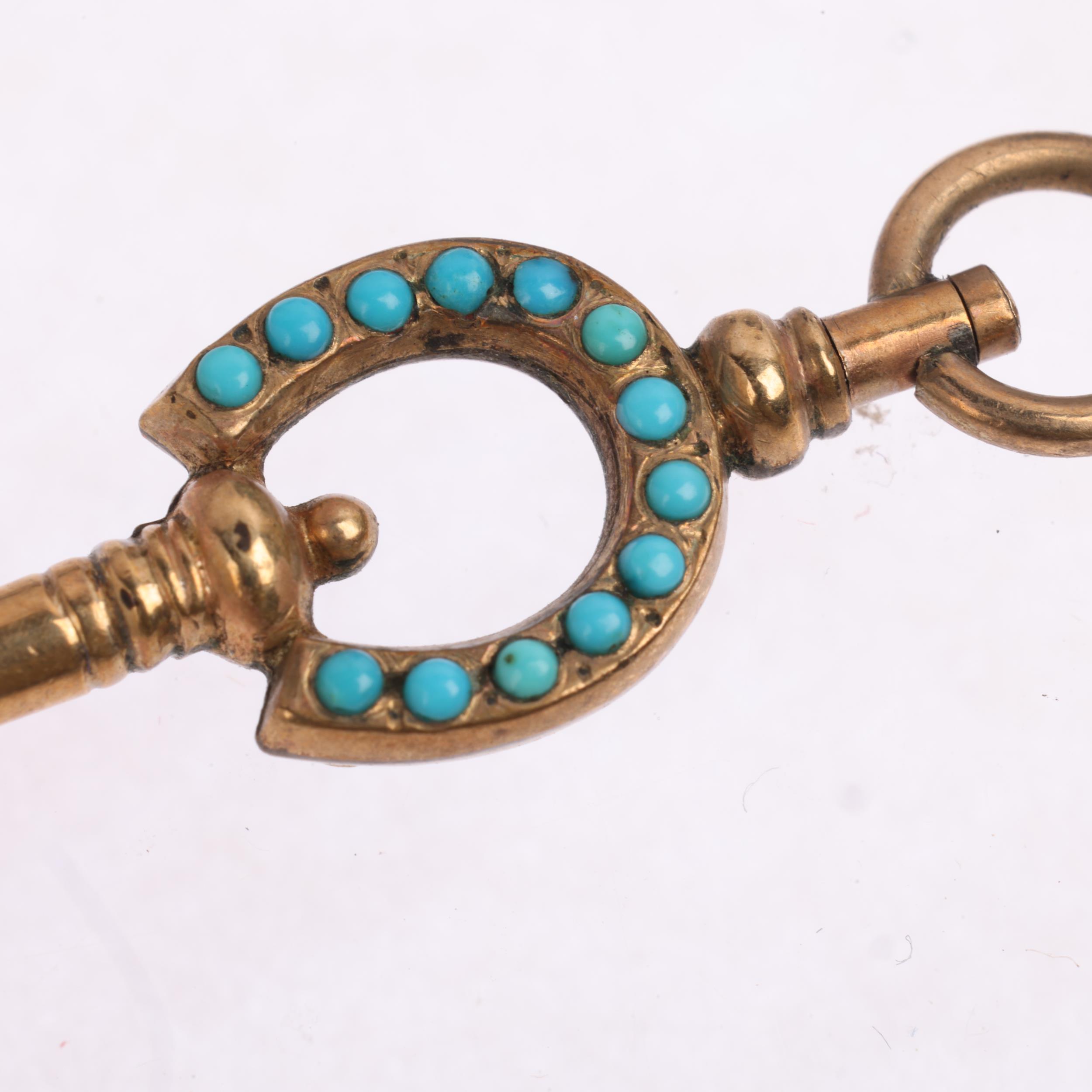 A Victorian turquoise lucky horseshoe pocket watch key, 30.2mm, 1.6g Condition Report: No damage - Image 3 of 4